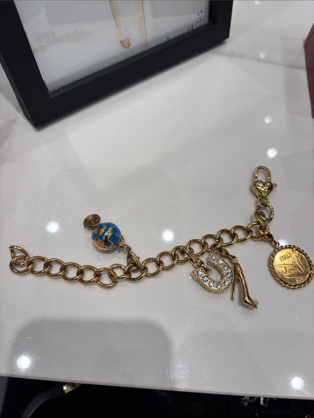 Gold-Tone Charm Bracelet with Blue Enamel Globe and Crystal Accents